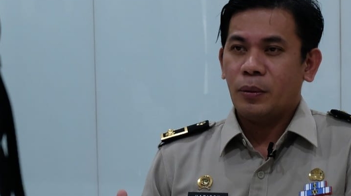 Kakan BPN Tangsel, Harrison Mokodompis