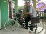 Boga Ontel Konvoi Sepeda dengan Pakaian Adat Nusantara